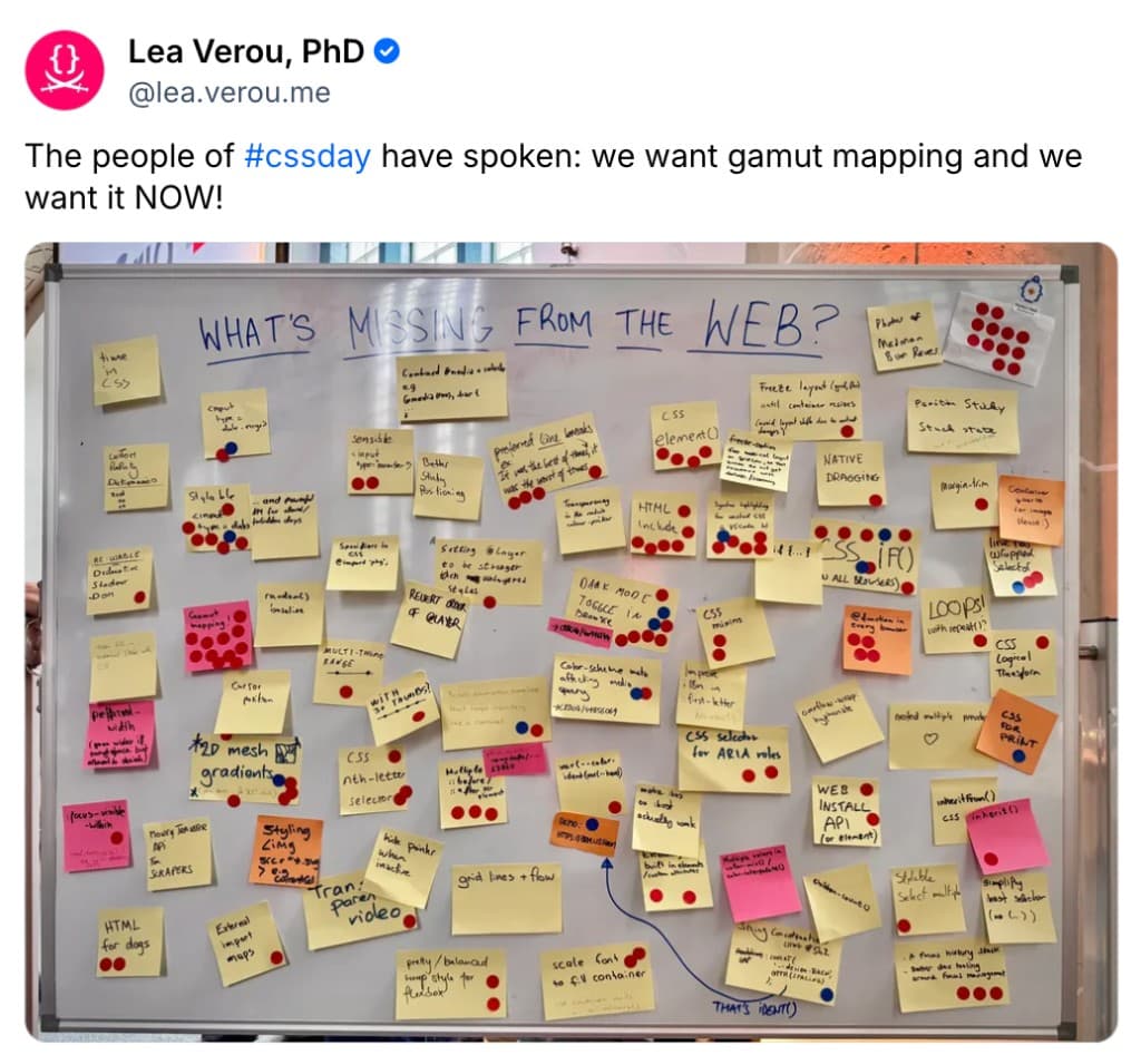 Post-it board at the Google stand asking "What's missing from the web?" with many sticky notes and dot votes