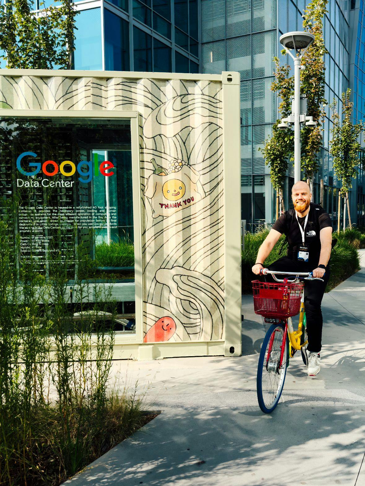 Dave bitter on the Google Campus in San Francisco riding a Google bike